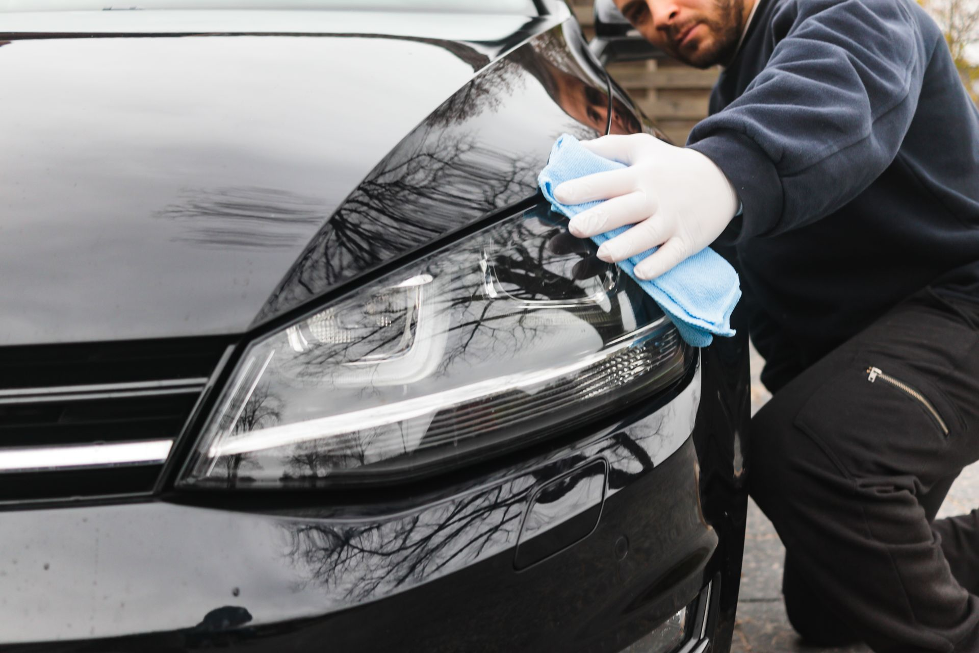 Joey detailing a car
